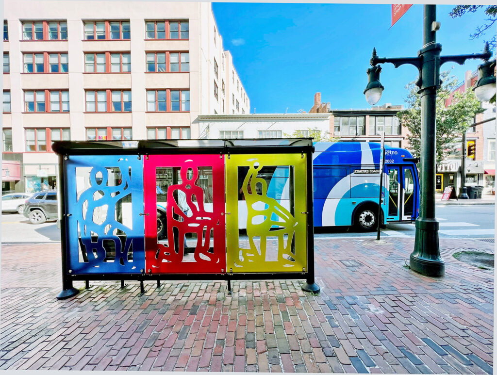 artistic bus shelter and bus in downtown